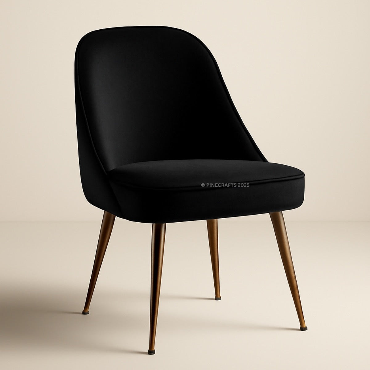 Black chair with bronze legs on a beige background